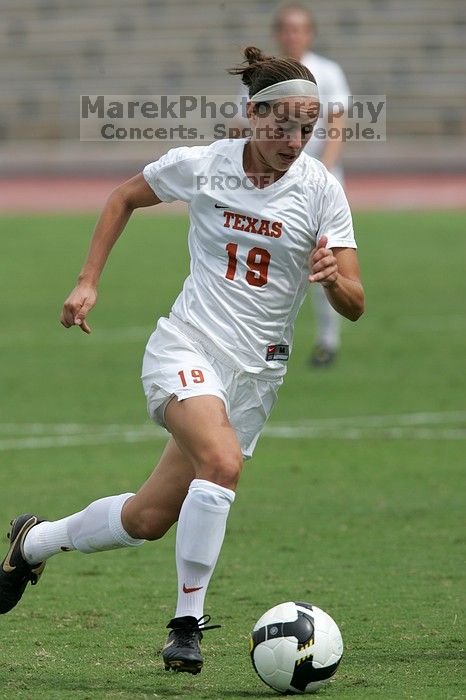 UT sophomore Erica Campanelli (#19, Defender) in the second half.  The University of Texas women's soccer team won 2-1 against the Iowa State Cyclones Sunday afternoon, October 5, 2008.

Filename: SRM_20081005_13234251.jpg
Aperture: f/5.6
Shutter Speed: 1/2500
Body: Canon EOS-1D Mark II
Lens: Canon EF 300mm f/2.8 L IS