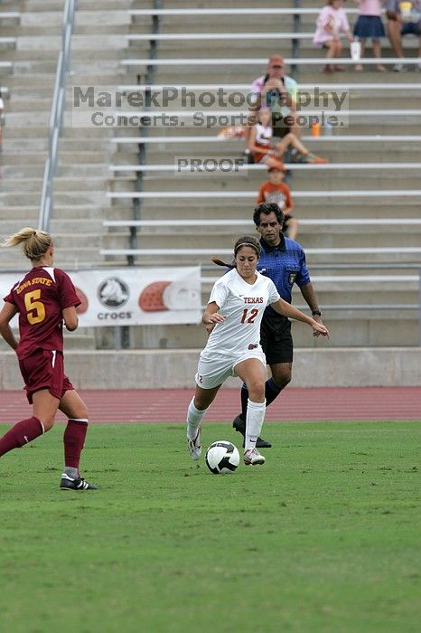 UT sophomore Alisha Ortiz (#12, Forward) in the second half.  The University of Texas women's soccer team won 2-1 against the Iowa State Cyclones Sunday afternoon, October 5, 2008.

Filename: SRM_20081005_13244666.jpg
Aperture: f/5.6
Shutter Speed: 1/1600
Body: Canon EOS-1D Mark II
Lens: Canon EF 300mm f/2.8 L IS