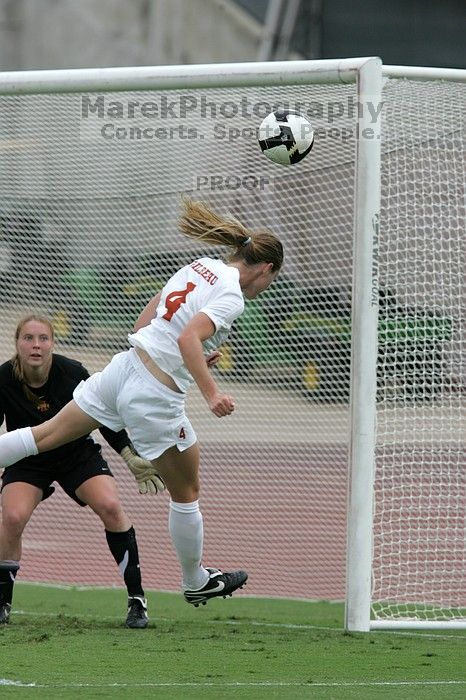 UT senior Jill Gilbeau (#4, Defender and Midfielder) takes a shot on goal in the second half.  The University of Texas women's soccer team won 2-1 against the Iowa State Cyclones Sunday afternoon, October 5, 2008.

Filename: SRM_20081005_13244871.jpg
Aperture: f/5.6
Shutter Speed: 1/2000
Body: Canon EOS-1D Mark II
Lens: Canon EF 300mm f/2.8 L IS