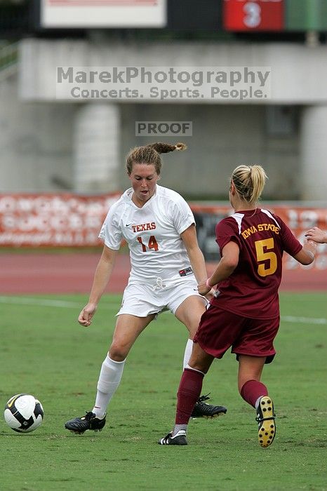 UT senior Kasey Moore (#14, Defender) in the second half.  The University of Texas women's soccer team won 2-1 against the Iowa State Cyclones Sunday afternoon, October 5, 2008.

Filename: SRM_20081005_13260826.jpg
Aperture: f/5.6
Shutter Speed: 1/1600
Body: Canon EOS-1D Mark II
Lens: Canon EF 300mm f/2.8 L IS