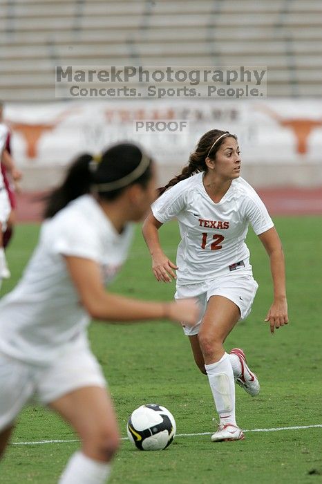 UT sophomore Alisha Ortiz (#12, Forward) in the second half.  The University of Texas women's soccer team won 2-1 against the Iowa State Cyclones Sunday afternoon, October 5, 2008.

Filename: SRM_20081005_13262229.jpg
Aperture: f/5.6
Shutter Speed: 1/1600
Body: Canon EOS-1D Mark II
Lens: Canon EF 300mm f/2.8 L IS