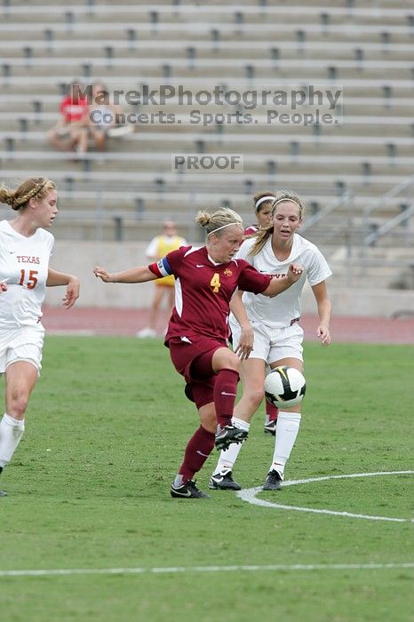 UT freshman Lucy Keith (#6, Midfielder) gets beat as UT freshman Kylie Doniak (#15, Midfielder) watches in the second half.  The University of Texas women's soccer team won 2-1 against the Iowa State Cyclones Sunday afternoon, October 5, 2008.

Filename: SRM_20081005_13265247.jpg
Aperture: f/5.6
Shutter Speed: 1/1000
Body: Canon EOS-1D Mark II
Lens: Canon EF 300mm f/2.8 L IS