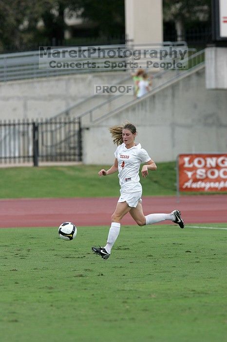 UT senior Jill Gilbeau (#4, Defender and Midfielder) in the second half.  The University of Texas women's soccer team won 2-1 against the Iowa State Cyclones Sunday afternoon, October 5, 2008.

Filename: SRM_20081005_13275659.jpg
Aperture: f/5.6
Shutter Speed: 1/1250
Body: Canon EOS-1D Mark II
Lens: Canon EF 300mm f/2.8 L IS