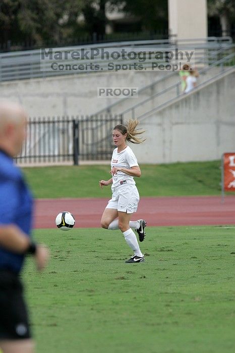 UT senior Jill Gilbeau (#4, Defender and Midfielder) in the second half.  The University of Texas women's soccer team won 2-1 against the Iowa State Cyclones Sunday afternoon, October 5, 2008.

Filename: SRM_20081005_13275660.jpg
Aperture: f/5.6
Shutter Speed: 1/1250
Body: Canon EOS-1D Mark II
Lens: Canon EF 300mm f/2.8 L IS