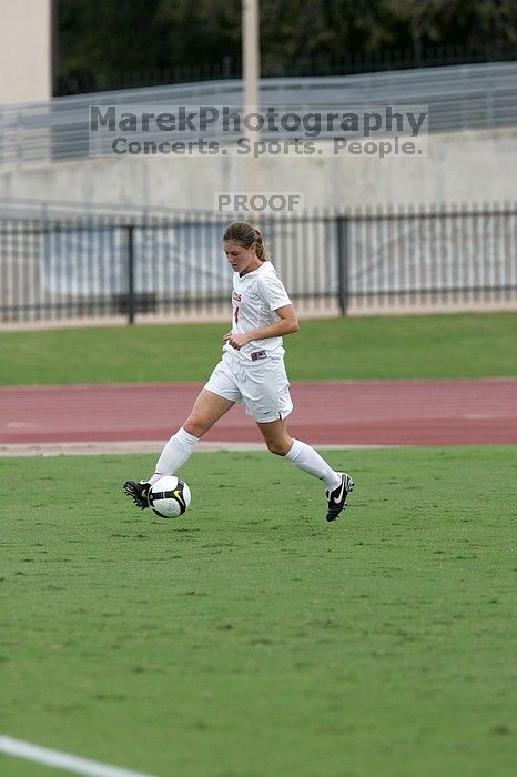 UT senior Jill Gilbeau (#4, Defender and Midfielder) in the second half.  The University of Texas women's soccer team won 2-1 against the Iowa State Cyclones Sunday afternoon, October 5, 2008.

Filename: SRM_20081005_13275861.jpg
Aperture: f/5.6
Shutter Speed: 1/1250
Body: Canon EOS-1D Mark II
Lens: Canon EF 300mm f/2.8 L IS