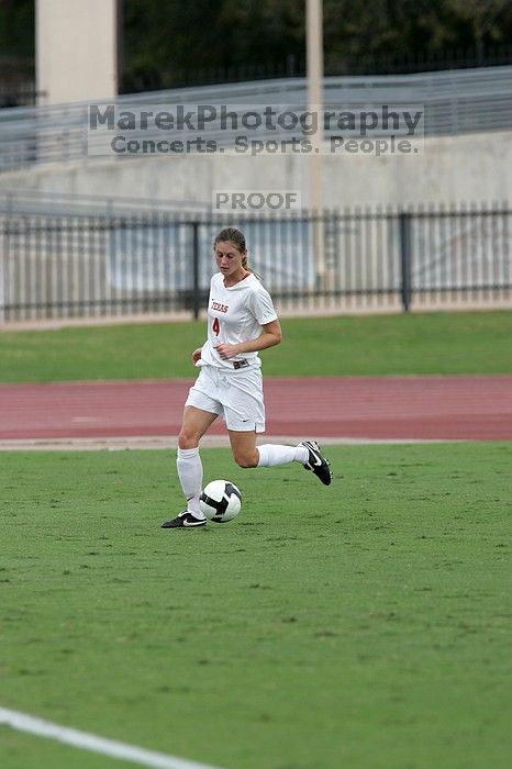 UT senior Jill Gilbeau (#4, Defender and Midfielder) in the second half.  The University of Texas women's soccer team won 2-1 against the Iowa State Cyclones Sunday afternoon, October 5, 2008.

Filename: SRM_20081005_13275862.jpg
Aperture: f/5.6
Shutter Speed: 1/1250
Body: Canon EOS-1D Mark II
Lens: Canon EF 300mm f/2.8 L IS