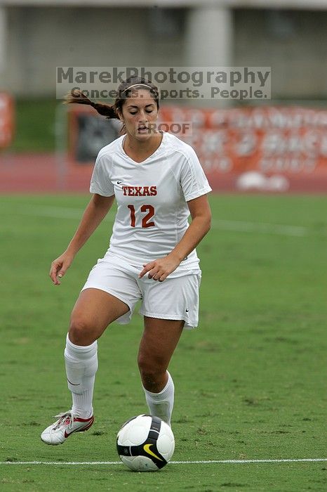 UT sophomore Alisha Ortiz (#12, Forward) in the second half.  The University of Texas women's soccer team won 2-1 against the Iowa State Cyclones Sunday afternoon, October 5, 2008.

Filename: SRM_20081005_13280468.jpg
Aperture: f/5.6
Shutter Speed: 1/1600
Body: Canon EOS-1D Mark II
Lens: Canon EF 300mm f/2.8 L IS