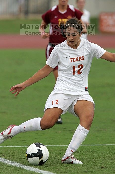 UT sophomore Alisha Ortiz (#12, Forward) in the second half.  The University of Texas women's soccer team won 2-1 against the Iowa State Cyclones Sunday afternoon, October 5, 2008.

Filename: SRM_20081005_13280877.jpg
Aperture: f/5.6
Shutter Speed: 1/1600
Body: Canon EOS-1D Mark II
Lens: Canon EF 300mm f/2.8 L IS