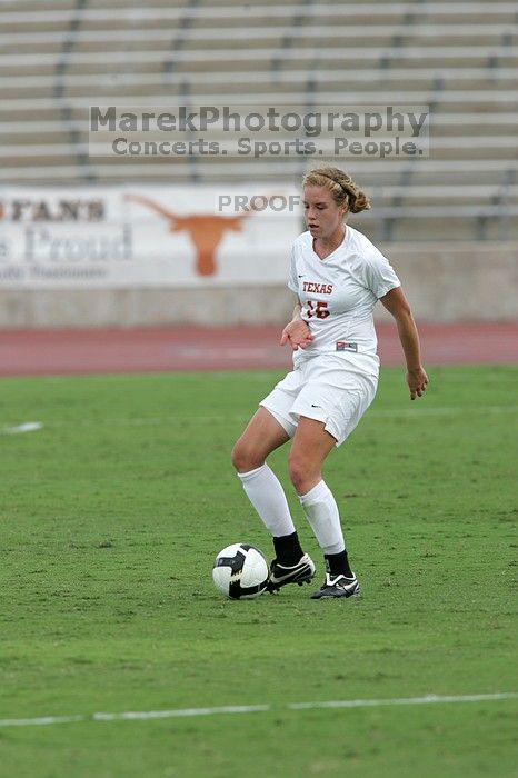 UT freshman Kylie Doniak (#15, Midfielder) in the second half.  The University of Texas women's soccer team won 2-1 against the Iowa State Cyclones Sunday afternoon, October 5, 2008.

Filename: SRM_20081005_13285896.jpg
Aperture: f/5.6
Shutter Speed: 1/1250
Body: Canon EOS-1D Mark II
Lens: Canon EF 300mm f/2.8 L IS