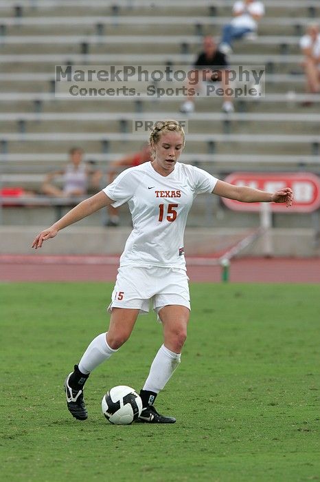 UT freshman Kylie Doniak (#15, Midfielder) in the second half.  The University of Texas women's soccer team won 2-1 against the Iowa State Cyclones Sunday afternoon, October 5, 2008.

Filename: SRM_20081005_13292004.jpg
Aperture: f/5.6
Shutter Speed: 1/1250
Body: Canon EOS-1D Mark II
Lens: Canon EF 300mm f/2.8 L IS