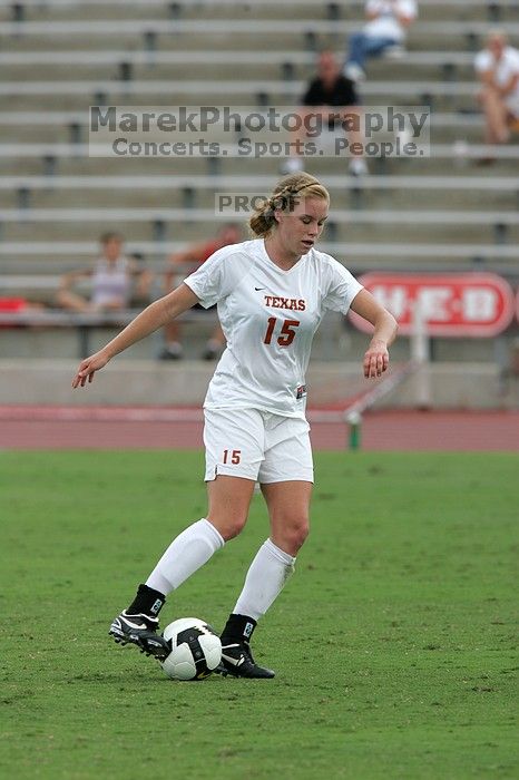 UT freshman Kylie Doniak (#15, Midfielder) in the second half.  The University of Texas women's soccer team won 2-1 against the Iowa State Cyclones Sunday afternoon, October 5, 2008.

Filename: SRM_20081005_13292005.jpg
Aperture: f/5.6
Shutter Speed: 1/1600
Body: Canon EOS-1D Mark II
Lens: Canon EF 300mm f/2.8 L IS