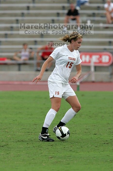 UT freshman Kylie Doniak (#15, Midfielder) in the second half.  The University of Texas women's soccer team won 2-1 against the Iowa State Cyclones Sunday afternoon, October 5, 2008.

Filename: SRM_20081005_13292006.jpg
Aperture: f/5.6
Shutter Speed: 1/1600
Body: Canon EOS-1D Mark II
Lens: Canon EF 300mm f/2.8 L IS