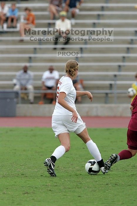 UT freshman Kylie Doniak (#15, Midfielder) in the second half.  The University of Texas women's soccer team won 2-1 against the Iowa State Cyclones Sunday afternoon, October 5, 2008.

Filename: SRM_20081005_13292207.jpg
Aperture: f/5.6
Shutter Speed: 1/1250
Body: Canon EOS-1D Mark II
Lens: Canon EF 300mm f/2.8 L IS