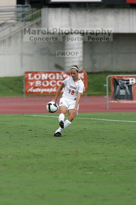 UT sophomore Erica Campanelli (#19, Defender) crosses the ball in the second half.  The University of Texas women's soccer team won 2-1 against the Iowa State Cyclones Sunday afternoon, October 5, 2008.

Filename: SRM_20081005_13314637.jpg
Aperture: f/5.6
Shutter Speed: 1/1600
Body: Canon EOS-1D Mark II
Lens: Canon EF 300mm f/2.8 L IS