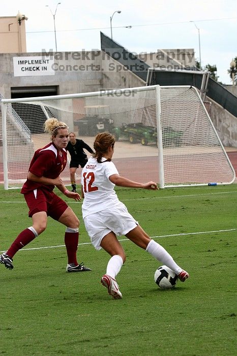 UT sophomore Alisha Ortiz (#12, Forward) in the second half.  The University of Texas women's soccer team won 2-1 against the Iowa State Cyclones Sunday afternoon, October 5, 2008.

Filename: SRM_20081005_13331003.jpg
Aperture: f/5.6
Shutter Speed: 1/1250
Body: Canon EOS 20D
Lens: Canon EF 80-200mm f/2.8 L