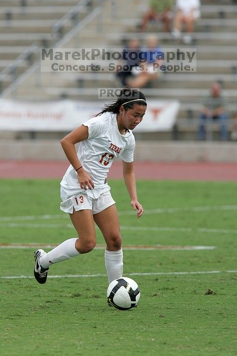 UT freshman Amanda Lisberger (#13, Midfielder) in the second half.  The University of Texas women's soccer team won 2-1 against the Iowa State Cyclones Sunday afternoon, October 5, 2008.

Filename: SRM_20081005_13340077.jpg
Aperture: f/5.6
Shutter Speed: 1/1250
Body: Canon EOS-1D Mark II
Lens: Canon EF 300mm f/2.8 L IS