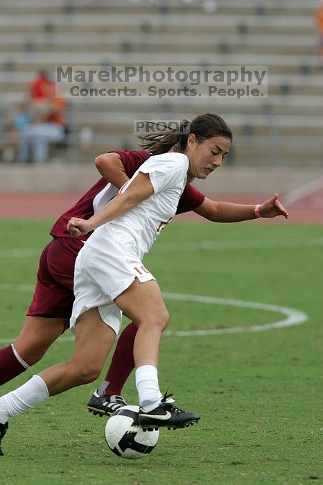 UT senior Stephanie Logterman (#10, Defender) in the second half.  The University of Texas women's soccer team won 2-1 against the Iowa State Cyclones Sunday afternoon, October 5, 2008.

Filename: SRM_20081005_13340691.jpg
Aperture: f/5.6
Shutter Speed: 1/1600
Body: Canon EOS-1D Mark II
Lens: Canon EF 300mm f/2.8 L IS