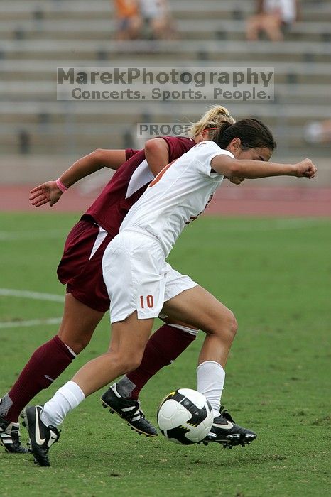 UT senior Stephanie Logterman (#10, Defender) in the second half.  The University of Texas women's soccer team won 2-1 against the Iowa State Cyclones Sunday afternoon, October 5, 2008.

Filename: SRM_20081005_13340693.jpg
Aperture: f/5.6
Shutter Speed: 1/1600
Body: Canon EOS-1D Mark II
Lens: Canon EF 300mm f/2.8 L IS