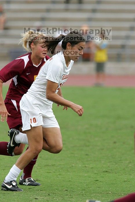 UT senior Stephanie Logterman (#10, Defender) in the second half.  The University of Texas women's soccer team won 2-1 against the Iowa State Cyclones Sunday afternoon, October 5, 2008.

Filename: SRM_20081005_13340800.jpg
Aperture: f/5.6
Shutter Speed: 1/1250
Body: Canon EOS-1D Mark II
Lens: Canon EF 300mm f/2.8 L IS