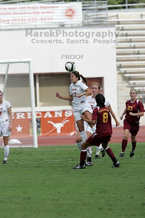 UT sophomore Alisha Ortiz (#12, Forward) gets the header in the second half.  The University of Texas women's soccer team won 2-1 against the Iowa State Cyclones Sunday afternoon, October 5, 2008.

Filename: SRM_20081005_13365207.jpg
Aperture: f/5.6
Shutter Speed: 1/2500
Body: Canon EOS-1D Mark II
Lens: Canon EF 300mm f/2.8 L IS