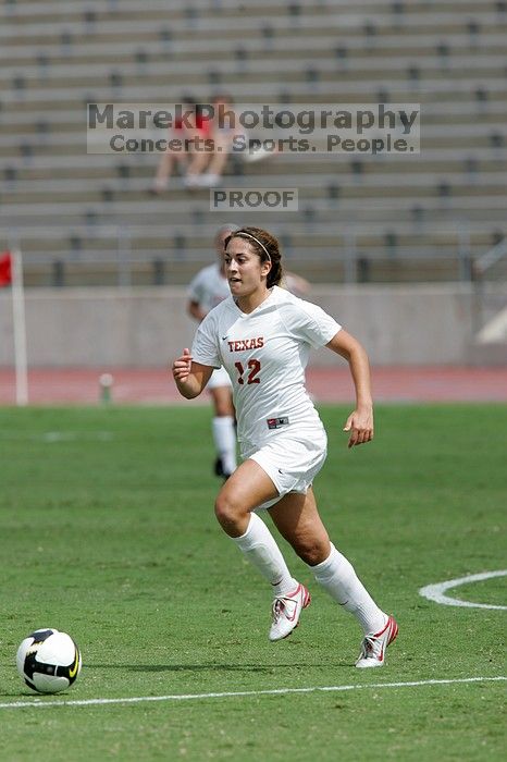 UT sophomore Alisha Ortiz (#12, Forward) in the second half.  The University of Texas women's soccer team won 2-1 against the Iowa State Cyclones Sunday afternoon, October 5, 2008.

Filename: SRM_20081005_13424462.jpg
Aperture: f/5.6
Shutter Speed: 1/2500
Body: Canon EOS-1D Mark II
Lens: Canon EF 300mm f/2.8 L IS