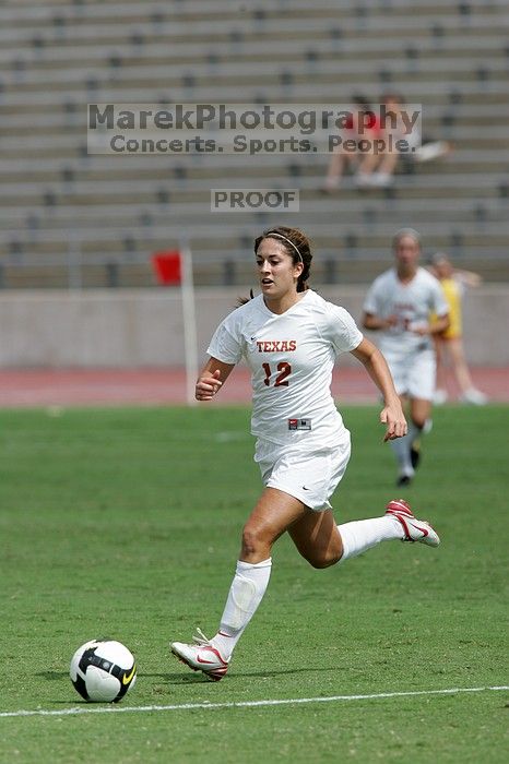 UT sophomore Alisha Ortiz (#12, Forward) in the second half.  The University of Texas women's soccer team won 2-1 against the Iowa State Cyclones Sunday afternoon, October 5, 2008.

Filename: SRM_20081005_13424463.jpg
Aperture: f/5.6
Shutter Speed: 1/2500
Body: Canon EOS-1D Mark II
Lens: Canon EF 300mm f/2.8 L IS