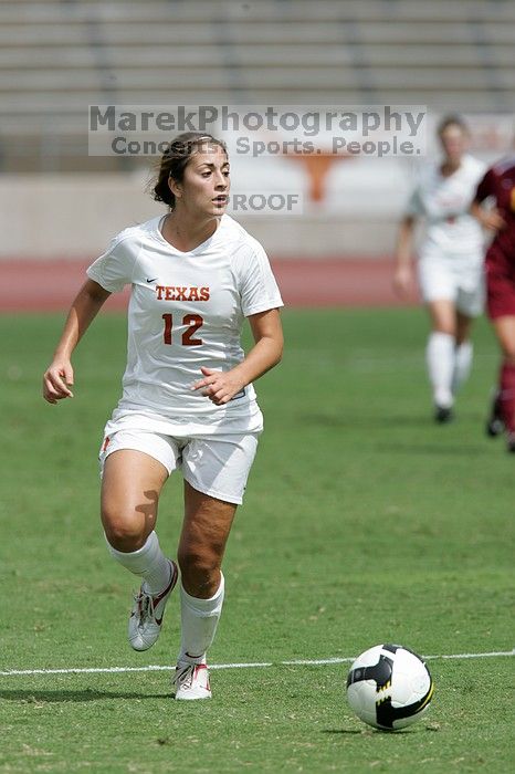 UT sophomore Alisha Ortiz (#12, Forward) in the second half.  The University of Texas women's soccer team won 2-1 against the Iowa State Cyclones Sunday afternoon, October 5, 2008.

Filename: SRM_20081005_13424873.jpg
Aperture: f/5.6
Shutter Speed: 1/3200
Body: Canon EOS-1D Mark II
Lens: Canon EF 300mm f/2.8 L IS