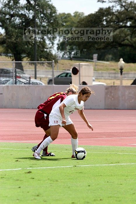 UT sophomore Alisha Ortiz (#12, Forward) in the second half.  The University of Texas women's soccer team won 2-1 against the Iowa State Cyclones Sunday afternoon, October 5, 2008.

Filename: SRM_20081005_13430224.jpg
Aperture: f/5.0
Shutter Speed: 1/2000
Body: Canon EOS 20D
Lens: Canon EF 80-200mm f/2.8 L