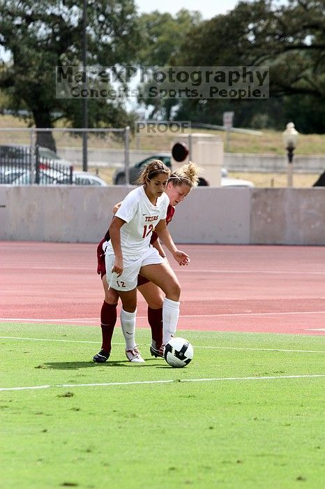 UT sophomore Alisha Ortiz (#12, Forward) in the second half.  The University of Texas women's soccer team won 2-1 against the Iowa State Cyclones Sunday afternoon, October 5, 2008.

Filename: SRM_20081005_13430426.jpg
Aperture: f/5.0
Shutter Speed: 1/2000
Body: Canon EOS 20D
Lens: Canon EF 80-200mm f/2.8 L