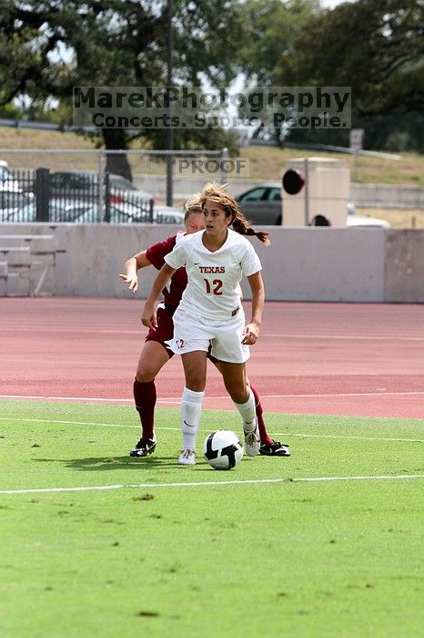 UT sophomore Alisha Ortiz (#12, Forward) in the second half.  The University of Texas women's soccer team won 2-1 against the Iowa State Cyclones Sunday afternoon, October 5, 2008.

Filename: SRM_20081005_13430627.jpg
Aperture: f/5.0
Shutter Speed: 1/2000
Body: Canon EOS 20D
Lens: Canon EF 80-200mm f/2.8 L