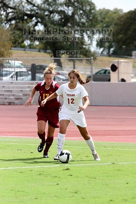 UT sophomore Alisha Ortiz (#12, Forward) in the second half.  The University of Texas women's soccer team won 2-1 against the Iowa State Cyclones Sunday afternoon, October 5, 2008.

Filename: SRM_20081005_13430828.jpg
Aperture: f/5.0
Shutter Speed: 1/2000
Body: Canon EOS 20D
Lens: Canon EF 80-200mm f/2.8 L