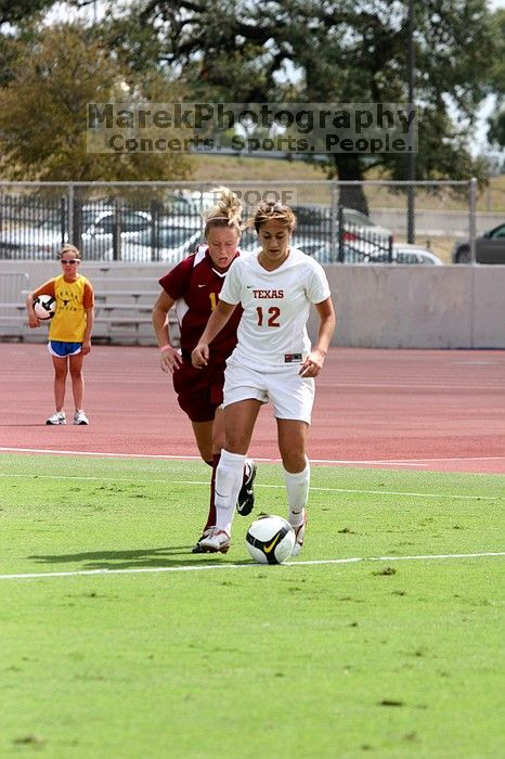 UT sophomore Alisha Ortiz (#12, Forward) in the second half.  The University of Texas women's soccer team won 2-1 against the Iowa State Cyclones Sunday afternoon, October 5, 2008.

Filename: SRM_20081005_13431030.jpg
Aperture: f/5.0
Shutter Speed: 1/2000
Body: Canon EOS 20D
Lens: Canon EF 80-200mm f/2.8 L