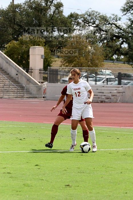 UT sophomore Alisha Ortiz (#12, Forward) in the second half.  The University of Texas women's soccer team won 2-1 against the Iowa State Cyclones Sunday afternoon, October 5, 2008.

Filename: SRM_20081005_13431232.jpg
Aperture: f/5.0
Shutter Speed: 1/2500
Body: Canon EOS 20D
Lens: Canon EF 80-200mm f/2.8 L