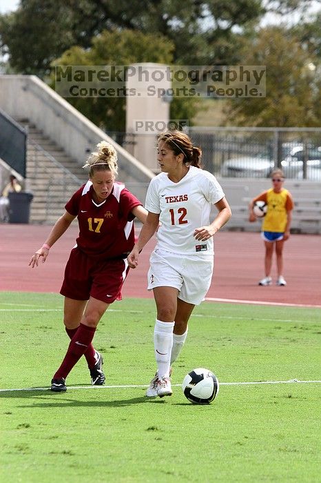 UT sophomore Alisha Ortiz (#12, Forward) in the second half.  The University of Texas women's soccer team won 2-1 against the Iowa State Cyclones Sunday afternoon, October 5, 2008.

Filename: SRM_20081005_13431233.jpg
Aperture: f/5.0
Shutter Speed: 1/2000
Body: Canon EOS 20D
Lens: Canon EF 80-200mm f/2.8 L