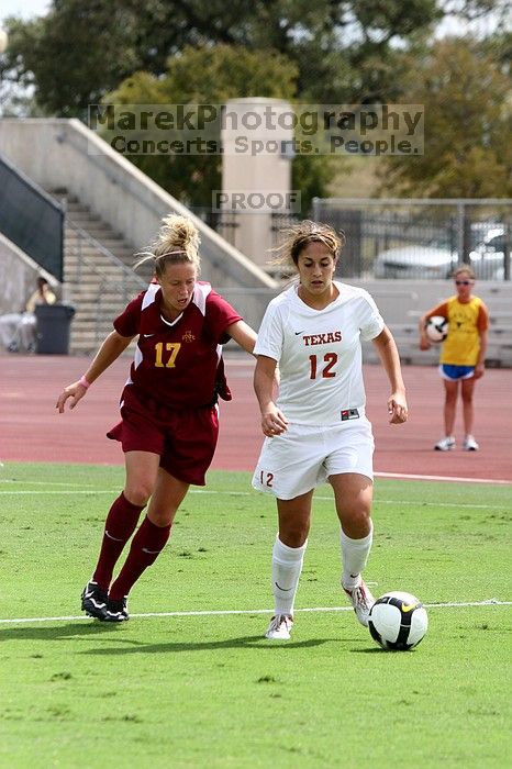 UT sophomore Alisha Ortiz (#12, Forward) in the second half.  The University of Texas women's soccer team won 2-1 against the Iowa State Cyclones Sunday afternoon, October 5, 2008.

Filename: SRM_20081005_13431434.jpg
Aperture: f/5.0
Shutter Speed: 1/2000
Body: Canon EOS 20D
Lens: Canon EF 80-200mm f/2.8 L