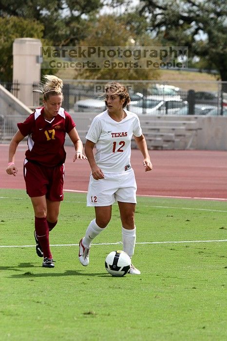 UT sophomore Alisha Ortiz (#12, Forward) in the second half.  The University of Texas women's soccer team won 2-1 against the Iowa State Cyclones Sunday afternoon, October 5, 2008.

Filename: SRM_20081005_13431435.jpg
Aperture: f/5.0
Shutter Speed: 1/2500
Body: Canon EOS 20D
Lens: Canon EF 80-200mm f/2.8 L