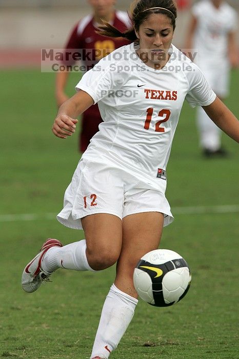 UT sophomore Alisha Ortiz (#12, Forward) in the second half.  The University of Texas women's soccer team won 2-1 against the Iowa State Cyclones Sunday afternoon, October 5, 2008.

Filename: SRM_20081005_13450686.jpg
Aperture: f/5.6
Shutter Speed: 1/2000
Body: Canon EOS-1D Mark II
Lens: Canon EF 300mm f/2.8 L IS