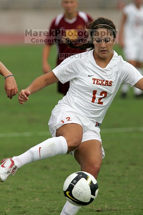 UT sophomore Alisha Ortiz (#12, Forward) in the second half.  The University of Texas women's soccer team won 2-1 against the Iowa State Cyclones Sunday afternoon, October 5, 2008.

Filename: SRM_20081005_13450687.jpg
Aperture: f/5.6
Shutter Speed: 1/2500
Body: Canon EOS-1D Mark II
Lens: Canon EF 300mm f/2.8 L IS