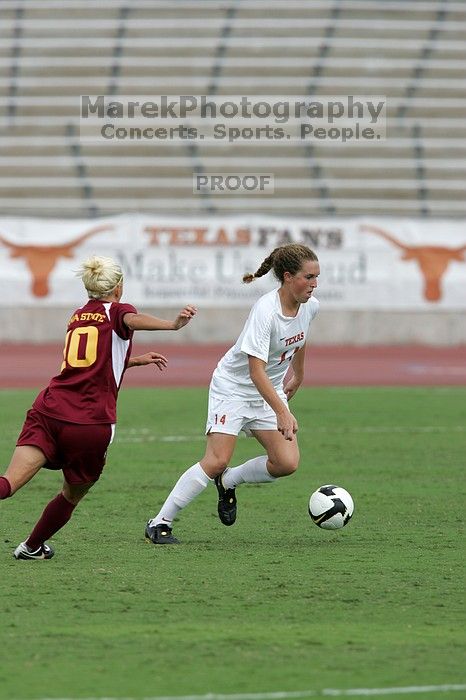 UT senior Kasey Moore (#14, Defender) in the second half.  The University of Texas women's soccer team won 2-1 against the Iowa State Cyclones Sunday afternoon, October 5, 2008.

Filename: SRM_20081005_13452093.jpg
Aperture: f/5.6
Shutter Speed: 1/1600
Body: Canon EOS-1D Mark II
Lens: Canon EF 300mm f/2.8 L IS