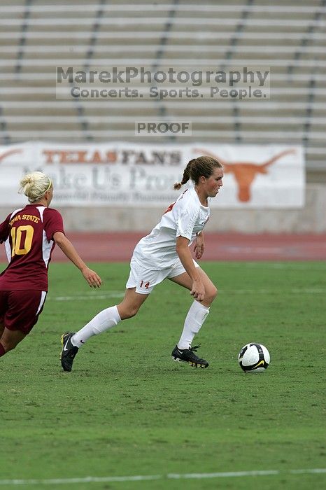 UT senior Kasey Moore (#14, Defender) in the second half.  The University of Texas women's soccer team won 2-1 against the Iowa State Cyclones Sunday afternoon, October 5, 2008.

Filename: SRM_20081005_13452094.jpg
Aperture: f/5.6
Shutter Speed: 1/2000
Body: Canon EOS-1D Mark II
Lens: Canon EF 300mm f/2.8 L IS