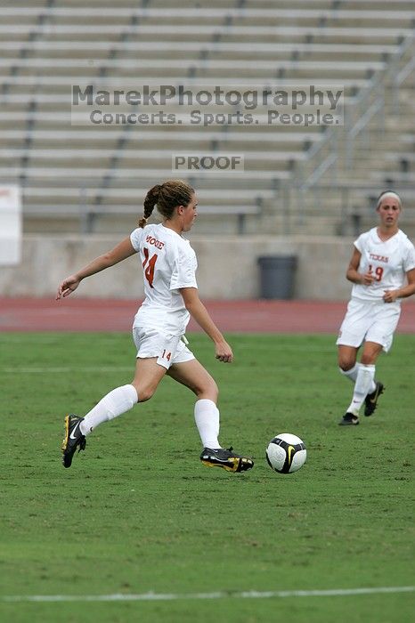 UT senior Kasey Moore (#14, Defender) in the second half.  The University of Texas women's soccer team won 2-1 against the Iowa State Cyclones Sunday afternoon, October 5, 2008.

Filename: SRM_20081005_13452095.jpg
Aperture: f/5.6
Shutter Speed: 1/2000
Body: Canon EOS-1D Mark II
Lens: Canon EF 300mm f/2.8 L IS