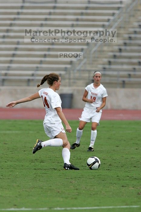 UT senior Kasey Moore (#14, Defender) in the second half.  The University of Texas women's soccer team won 2-1 against the Iowa State Cyclones Sunday afternoon, October 5, 2008.

Filename: SRM_20081005_13452096.jpg
Aperture: f/5.6
Shutter Speed: 1/2000
Body: Canon EOS-1D Mark II
Lens: Canon EF 300mm f/2.8 L IS