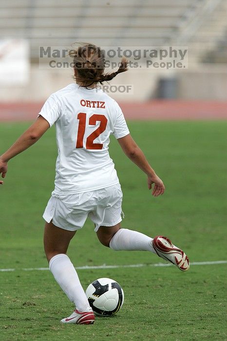 UT sophomore Alisha Ortiz (#12, Forward) in the second half.  The University of Texas women's soccer team won 2-1 against the Iowa State Cyclones Sunday afternoon, October 5, 2008.

Filename: SRM_20081005_13453800.jpg
Aperture: f/5.6
Shutter Speed: 1/2000
Body: Canon EOS-1D Mark II
Lens: Canon EF 300mm f/2.8 L IS