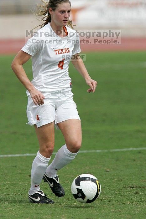 UT senior Jill Gilbeau (#4, Defender and Midfielder) in the second half.  The University of Texas women's soccer team won 2-1 against the Iowa State Cyclones Sunday afternoon, October 5, 2008.

Filename: SRM_20081005_13454410.jpg
Aperture: f/5.6
Shutter Speed: 1/2000
Body: Canon EOS-1D Mark II
Lens: Canon EF 300mm f/2.8 L IS