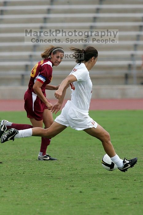 UT senior Stephanie Logterman (#10, Defender) in the second half.  The University of Texas women's soccer team won 2-1 against the Iowa State Cyclones Sunday afternoon, October 5, 2008.

Filename: SRM_20081005_13460818.jpg
Aperture: f/5.6
Shutter Speed: 1/1600
Body: Canon EOS-1D Mark II
Lens: Canon EF 300mm f/2.8 L IS