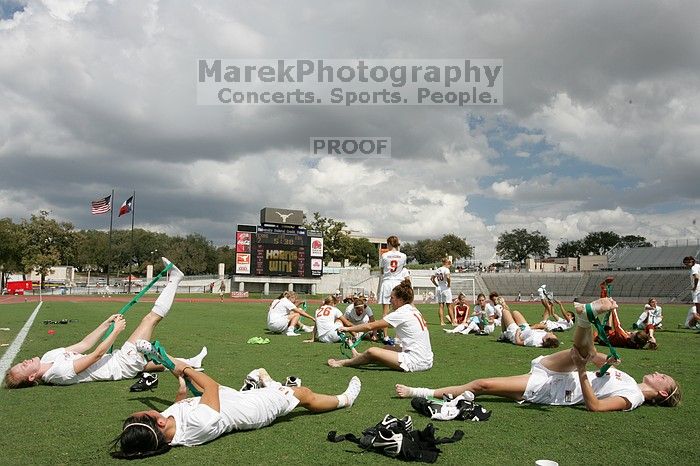 The team stretches after the match.  The University of Texas women's soccer team won 2-1 against the Iowa State Cyclones Sunday afternoon, October 5, 2008.

Filename: SRM_20081005_13531649.jpg
Aperture: f/11.0
Shutter Speed: 1/250
Body: Canon EOS-1D Mark II
Lens: Canon EF 16-35mm f/2.8 L