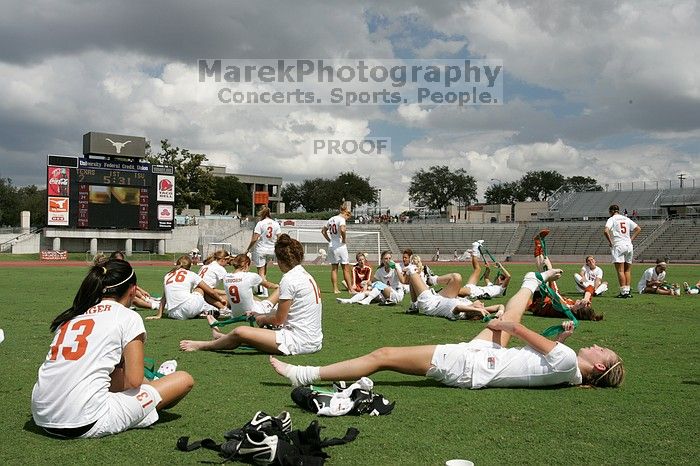 The team stretches after the match.  The University of Texas women's soccer team won 2-1 against the Iowa State Cyclones Sunday afternoon, October 5, 2008.

Filename: SRM_20081005_13532252.jpg
Aperture: f/11.0
Shutter Speed: 1/320
Body: Canon EOS-1D Mark II
Lens: Canon EF 16-35mm f/2.8 L