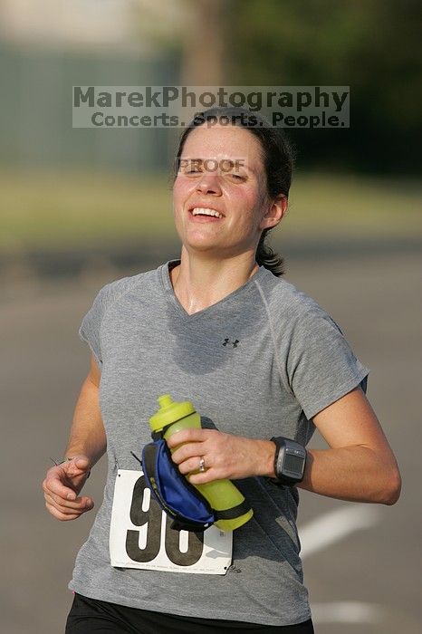 Beth Marek won first place in her age division at the Army Dillo half-marathon and 32K race.

Filename: SRM_20080921_0841443.jpg
Aperture: f/4.0
Shutter Speed: 1/2000
Body: Canon EOS-1D Mark II
Lens: Canon EF 300mm f/2.8 L IS