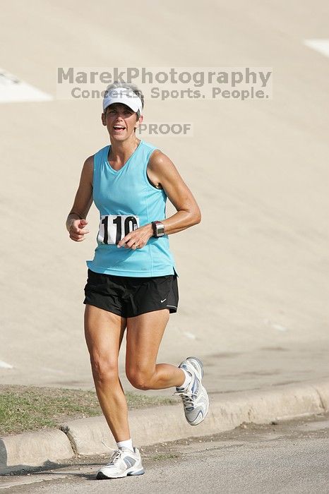 Karen Pearce placed second in her age groun at the Army Dillo half-marathon and 32K race.

Filename: SRM_20080921_0943549.jpg
Aperture: f/4.0
Shutter Speed: 1/2000
Body: Canon EOS-1D Mark II
Lens: Canon EF 300mm f/2.8 L IS