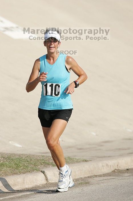 Karen Pearce placed second in her age groun at the Army Dillo half-marathon and 32K race.

Filename: SRM_20080921_0943560.jpg
Aperture: f/4.0
Shutter Speed: 1/2000
Body: Canon EOS-1D Mark II
Lens: Canon EF 300mm f/2.8 L IS